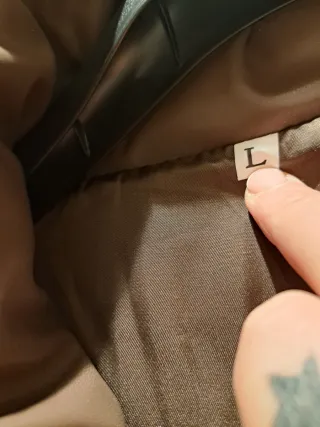 Abrigo acolchado efecto piel marrón