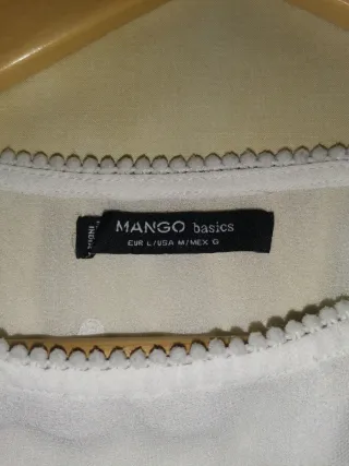 Blusa blanca manga larga bordada