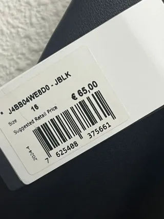 Pantalones Guess acampanados efecto piel