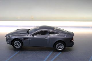 Aston Martin V12 Vanquish  Streetversion Carrera Evolution. Coche slot Mattel.  James Bond 007