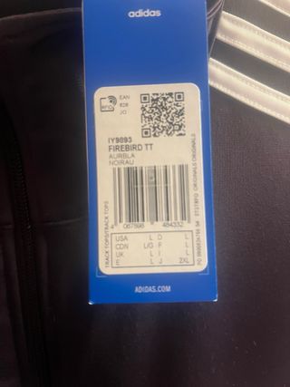 Chaqueta Adidas morada con rayas blancas