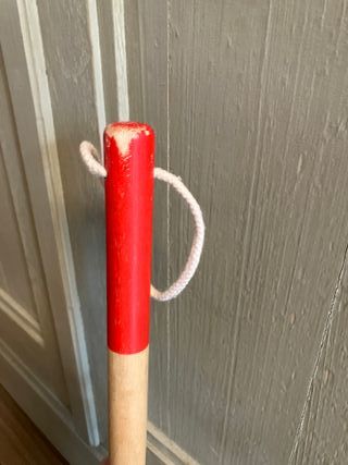 Sonajero de arrastre de madera