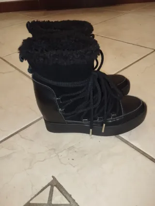 Stivaletti donna neri con pelliccia