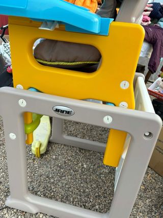 Trona Jane con cojín estampado como nueva