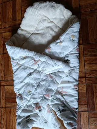 Copriletto avvolgente per neonato