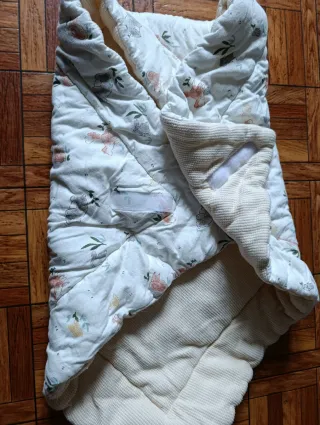 Copriletto avvolgente per neonato