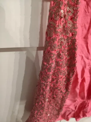Chaleco rosa y dorado con lentejuelas