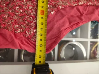 Chaleco rosa y dorado con lentejuelas