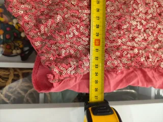 Chaleco rosa y dorado con lentejuelas