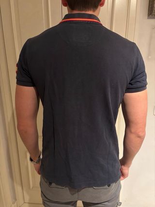 Polo azul marino con escudo España