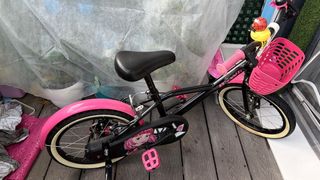 Bicicleta infantil rosa y negra