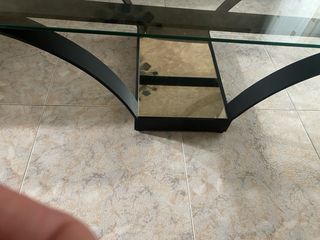 Mesas de hierro y cristal