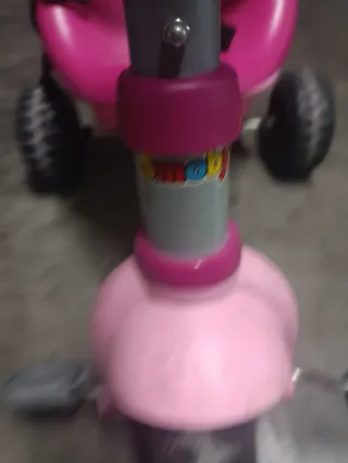 Triciclo bebé rosa con empujador marca smooby