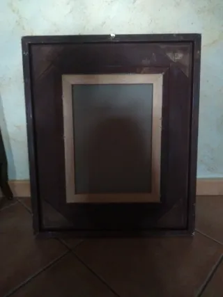 Quadro con cornice dorata