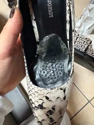 Décolleté donna maculate bianco e grigio