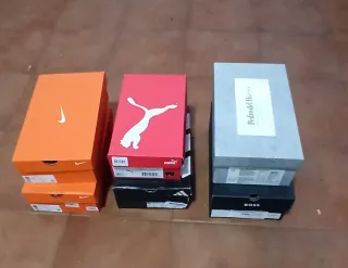 Cajas vacías Nike, Puma, Adidas, Boss y Pedro del