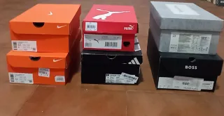 Cajas vacías Nike, Puma, Adidas, Boss y Pedro del