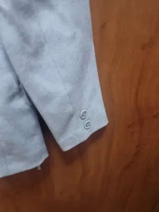 Chaqueta traje niño gris talla aprox 10 años.
