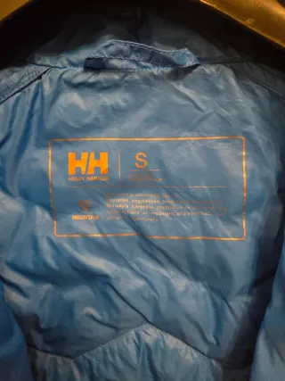 Abrigo Plumas Helly Hansen mujer. Talla S