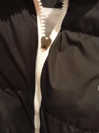 Cazadora de plumas negra hombre