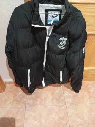 Cazadora de plumas negra hombre