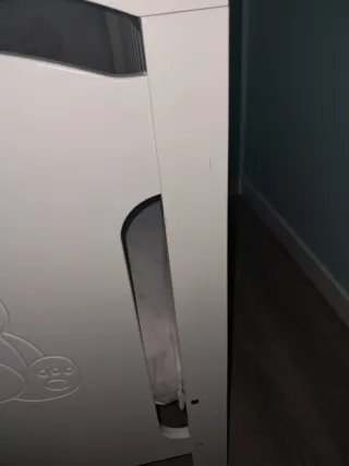 Cuna blanca con osito