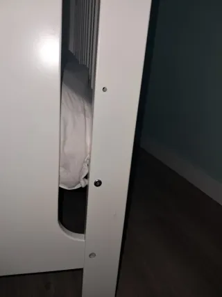 Cuna blanca con osito