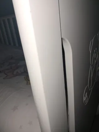 Cuna blanca con osito