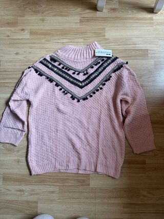 Jersey rosa con abalorios