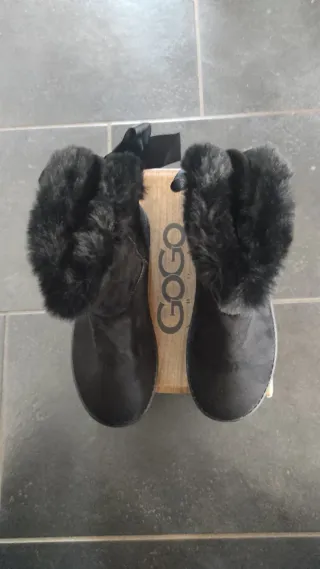 Stivaletti neri donna con fiocchi