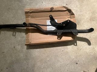 Soporte escapes Harley Sportster