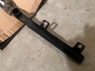 Soporte escapes Harley Sportster