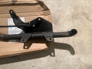 Soporte escapes Harley Sportster