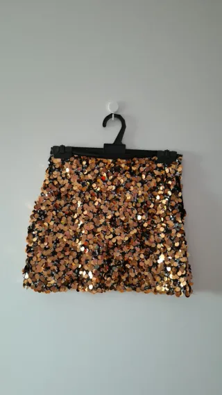 Falda lentejuelas doradas y negra
