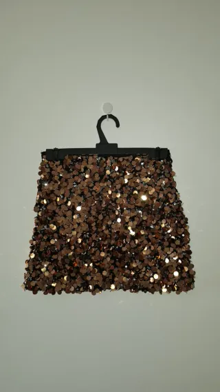 Falda lentejuelas doradas y negra