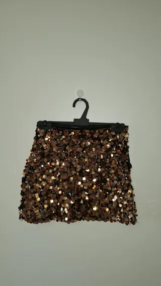 Falda lentejuelas doradas y negra