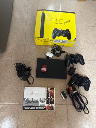 Playstation 2 con 2 mandos y cámara