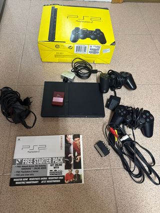 Playstation 2 con 2 mandos y cámara