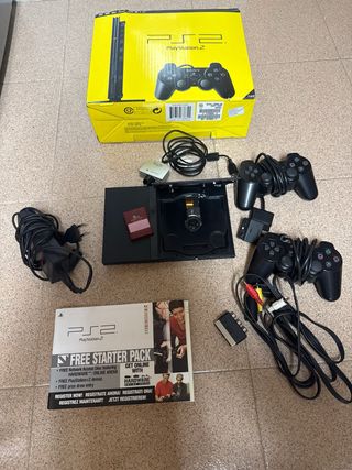 Playstation 2 con 2 mandos y cámara