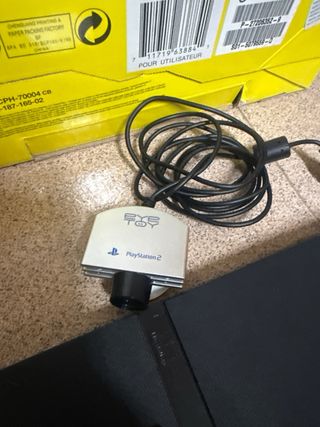 Playstation 2 con 2 mandos y cámara