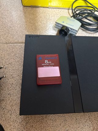 Playstation 2 con 2 mandos y cámara
