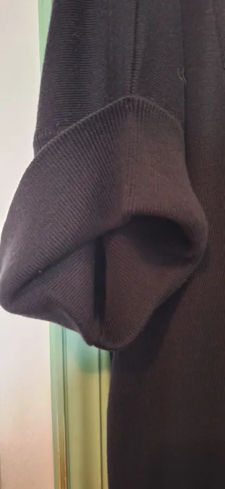 Gilet nero con bottone