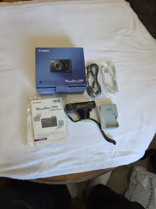 Cámara Canon PowerShot S90 Digital.