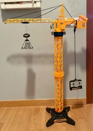 Grúa de juguete con barril