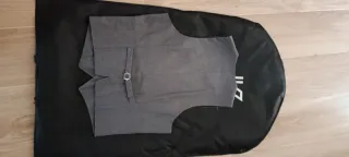 Traje de chaqueta gris con chaleco