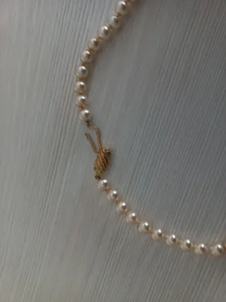 Conjunto de perlas y oro