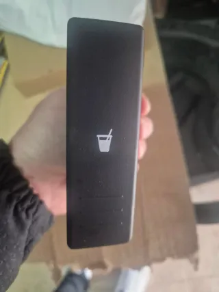 Portavasos negro con símbolo