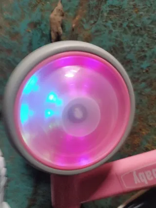 Bicicleta infantil rosa con ruedas de luces