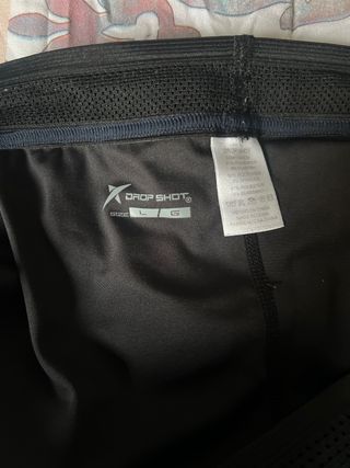 Drop Shot Calzonas Deportivas Teal y Negro.