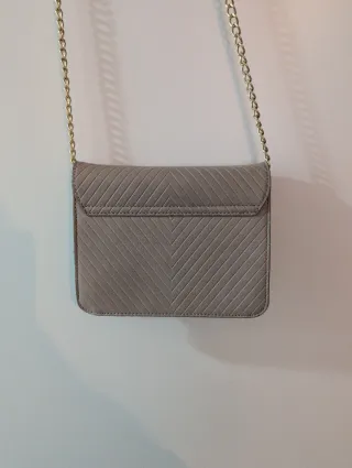Bolso pequeño Gloria Ortiz beige.
